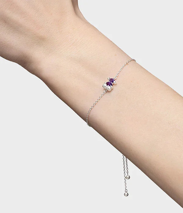 צמיד כסף עם פנינים ואבן סגולה אלגנטי על יד, מבית CHOZEN קבוצת אלפא