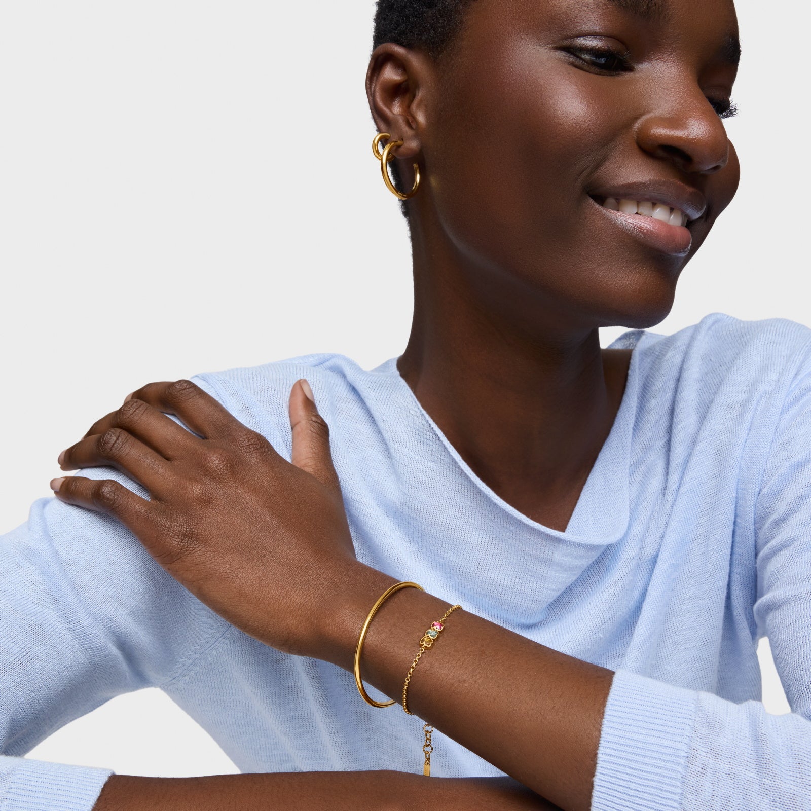 טואוס צמיד מוטיבי דובי בשיבוץ אבן חן Icon Color LGG מכסף ועליו זהב 18 קראט