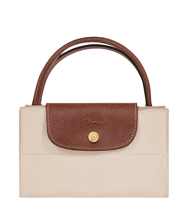 תיק יד יוקרתי בצבע בז' עם ידית ומכסה עור חום, מבית CHOZEN מותגים מובילים