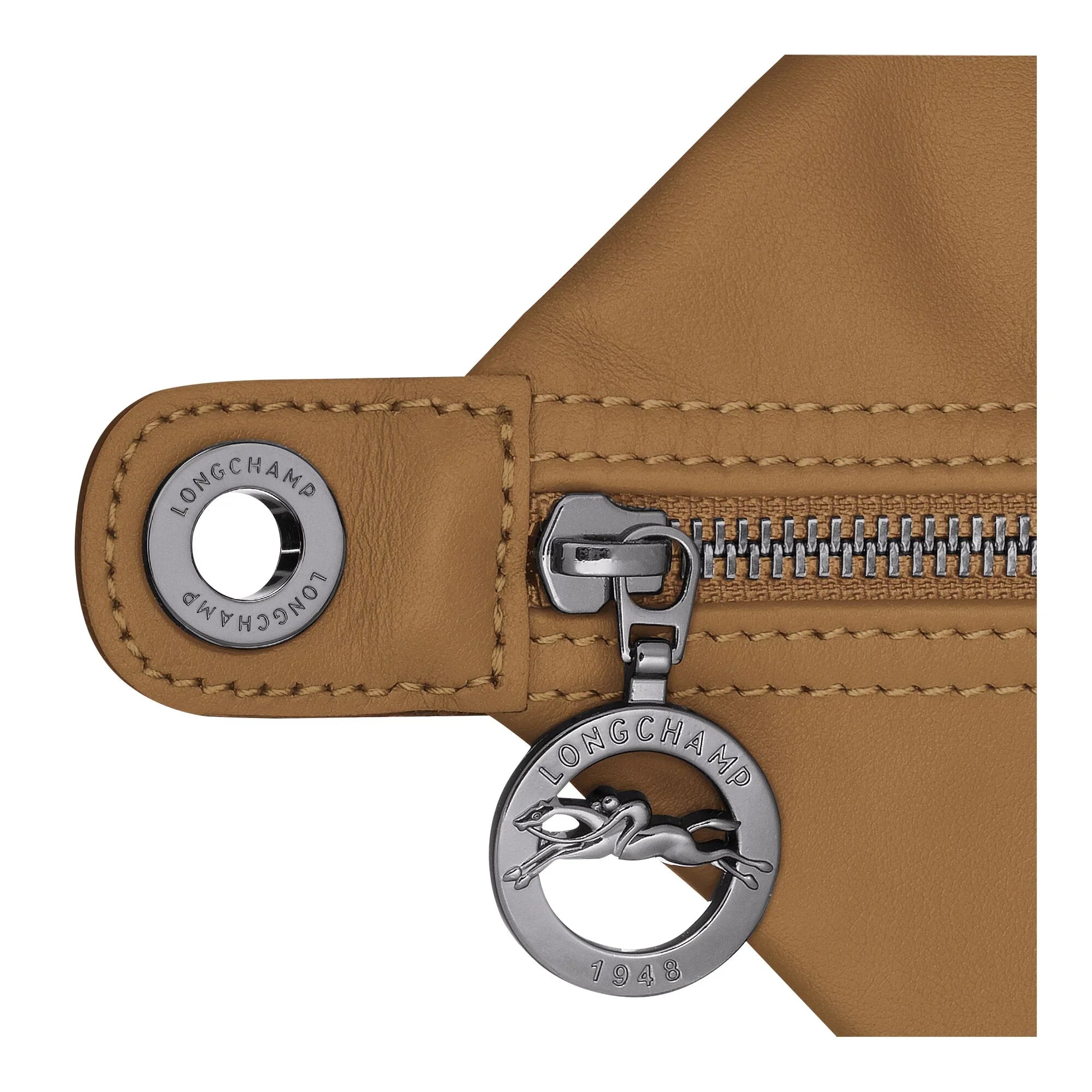 רוכסן תיק עור חום עם תגית לונגשאמפ, מותג יוקרה בינלאומי ב-CHOZEN