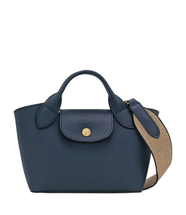 תיק יד קטן כחול עם רצועה מבד, מבית מותגים מובילים ב-CHOZEN