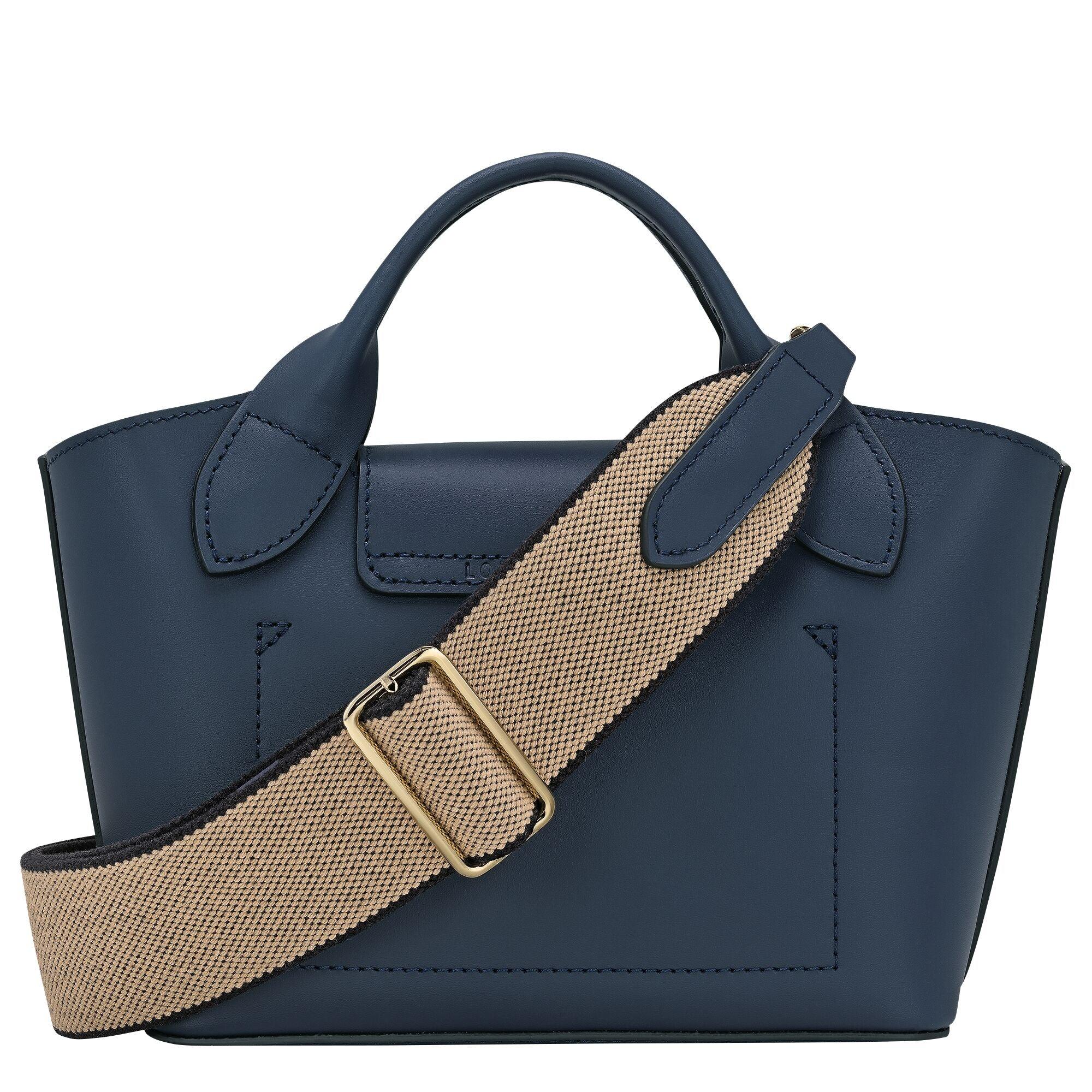 תיק יד כחול עם רצועה רחבה בצבע בז', עיצוב אופנתי באתר CHOZEN