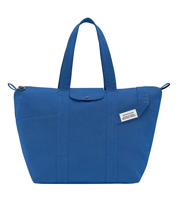 תיק יד כחול יוקרתי עם תווית לונגשאמפ, מבית המותגים של קבוצת אלפא CHOZEN