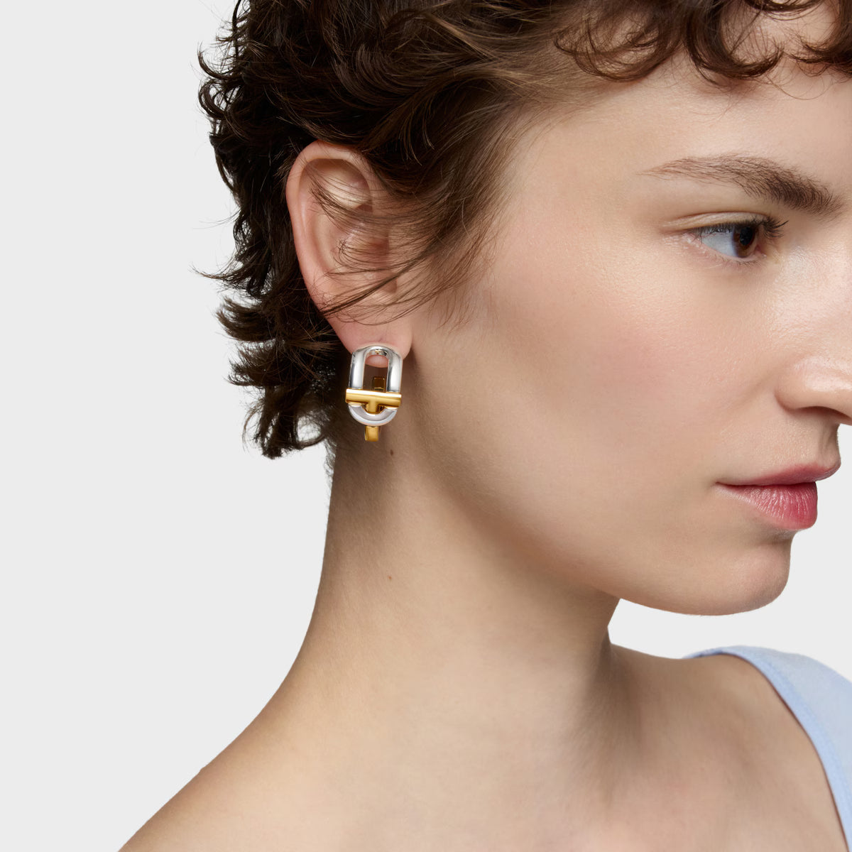 טואוס עגילי חישוק פתוחים MANIFESTO בשני גוונים