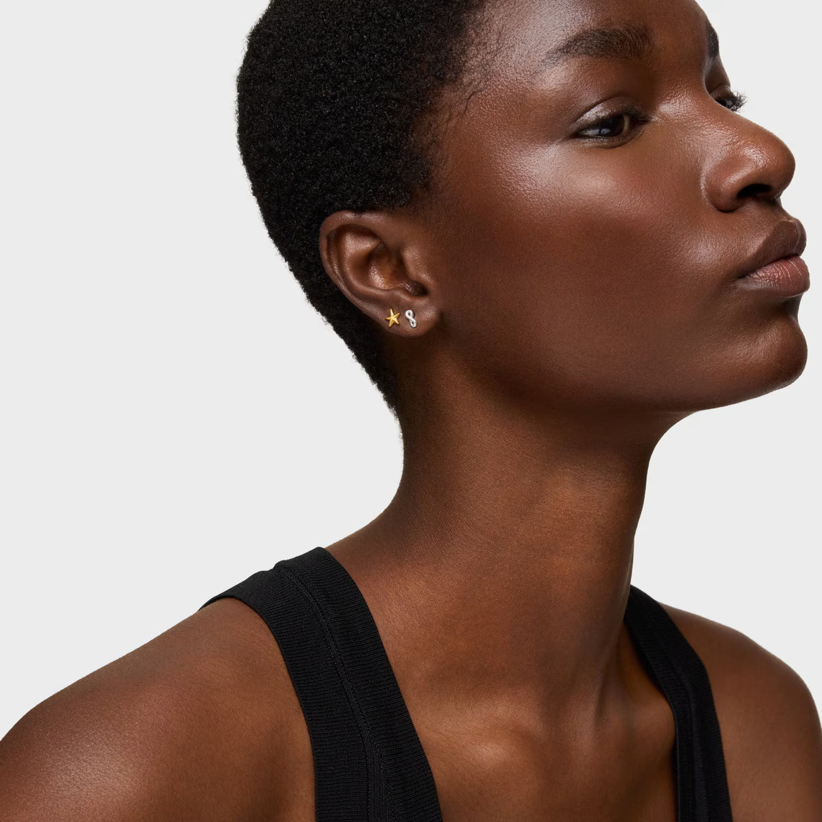 טואוס עגילים MOTIFS עם מוטיב אינסוף מכסף