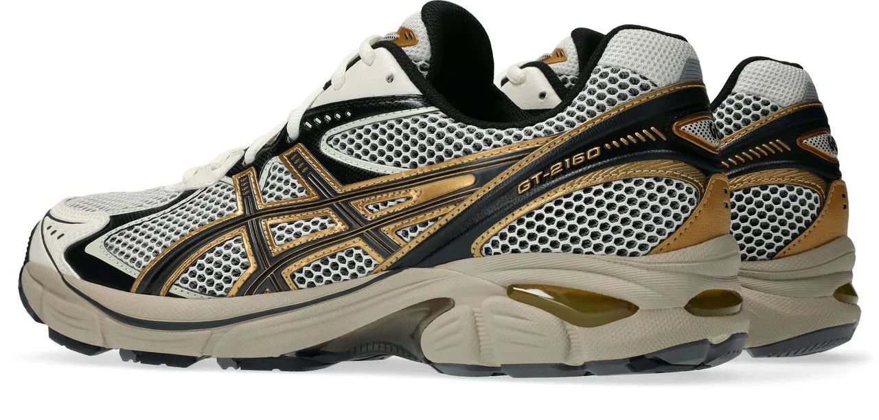 נעלי ספורט Asics GT-2160 בצבע לבן, זהב ושחור על רקע לבן מבית CHOZEN