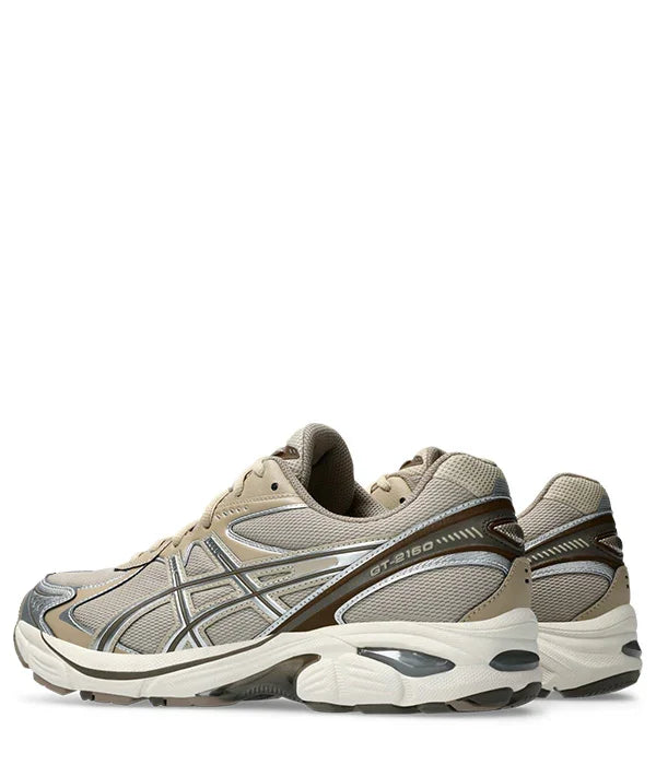 נעלי ספורט אסיקס GT-2160 בצבע בז' עם פסי כסף ודגם מודרני, באתר CHOZEN מותגים מובילים