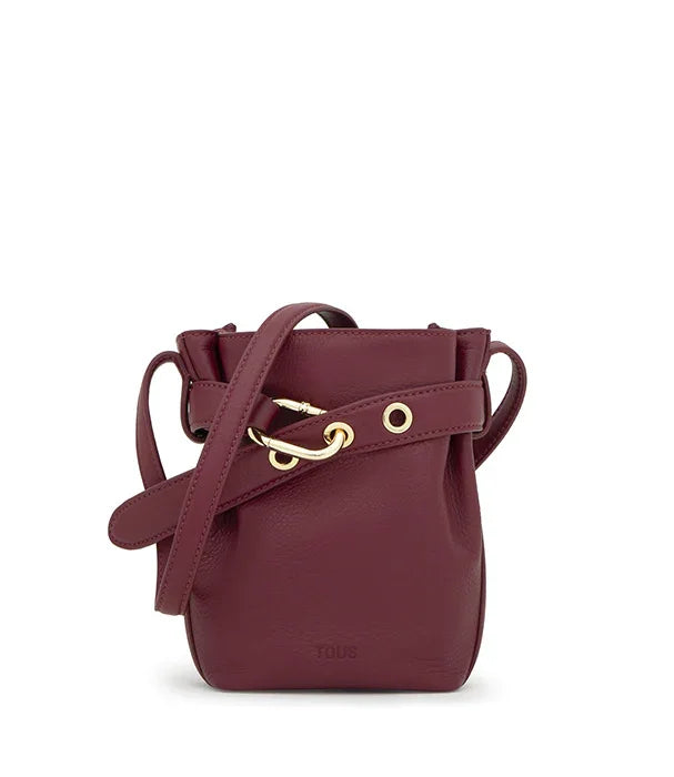 תיק עור בורדו עם רצועת כתף ואבזמי זהב מבית TOUS, מותג יוקרה ב-CHOZEN