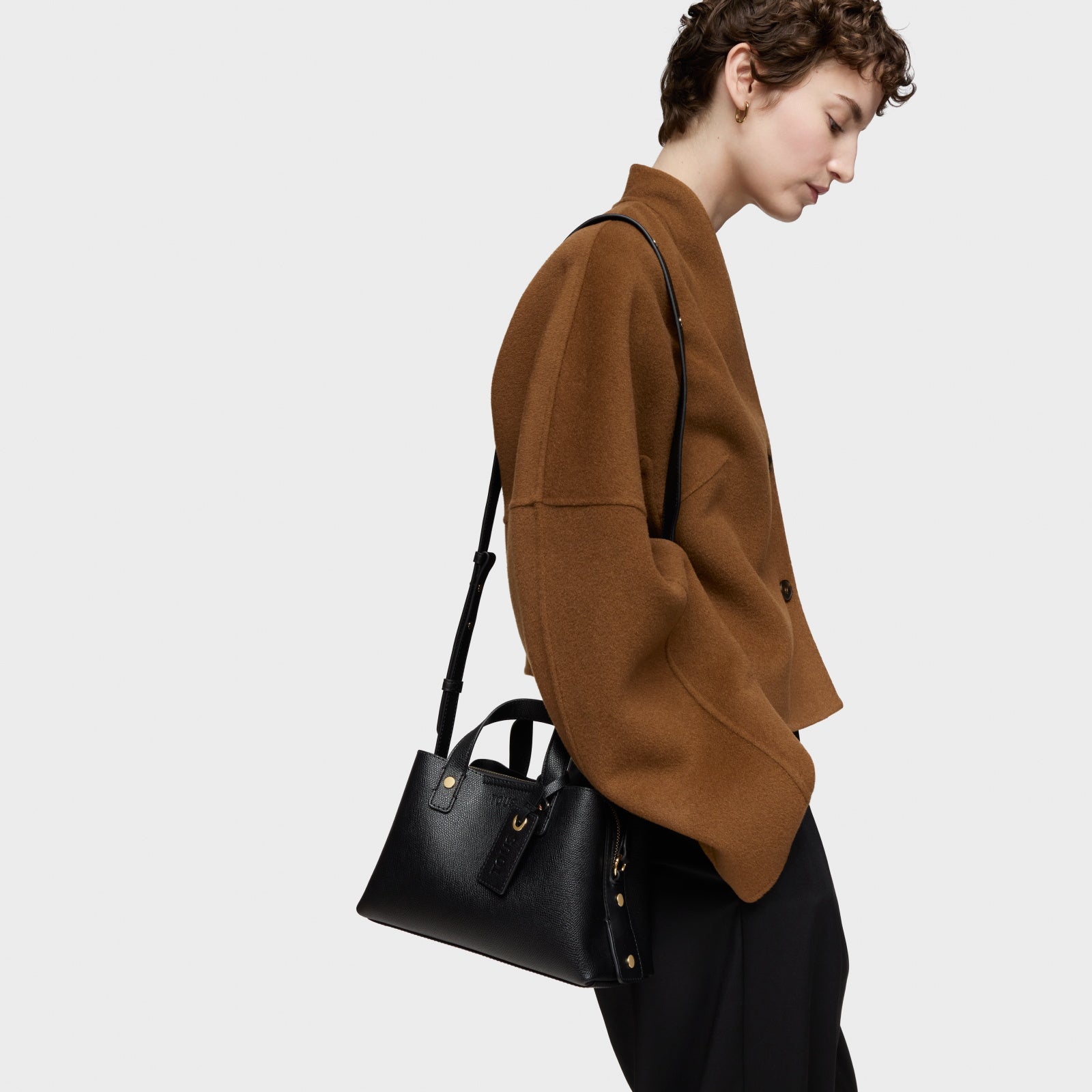 טואוס תיק יד קטן The Citybow שחור