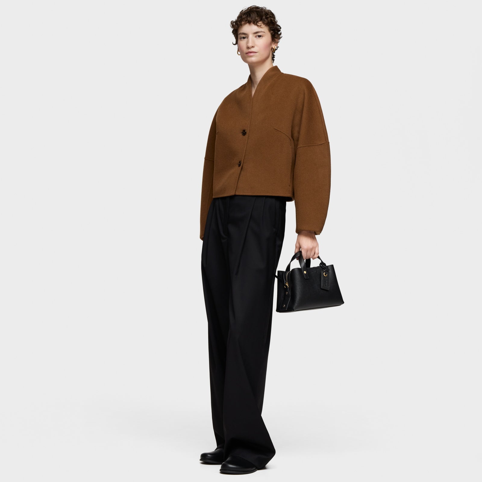 טואוס תיק יד קטן The Citybow שחור