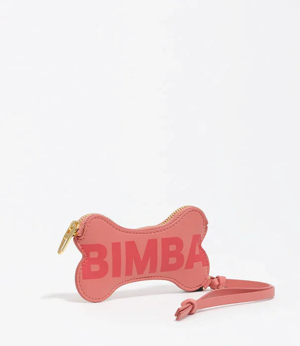 ארנק ורוד בצורת עצם עם רוכסן זהב וכיתוב BIMBA, מותג אופנה באתר CHOZEN