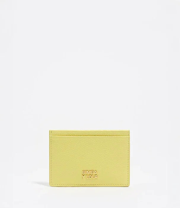 מחזיק כרטיסים צהוב של BIMBA Y LOLA על רקע לבן, קולקציית מותגים ב-CHOZEN
