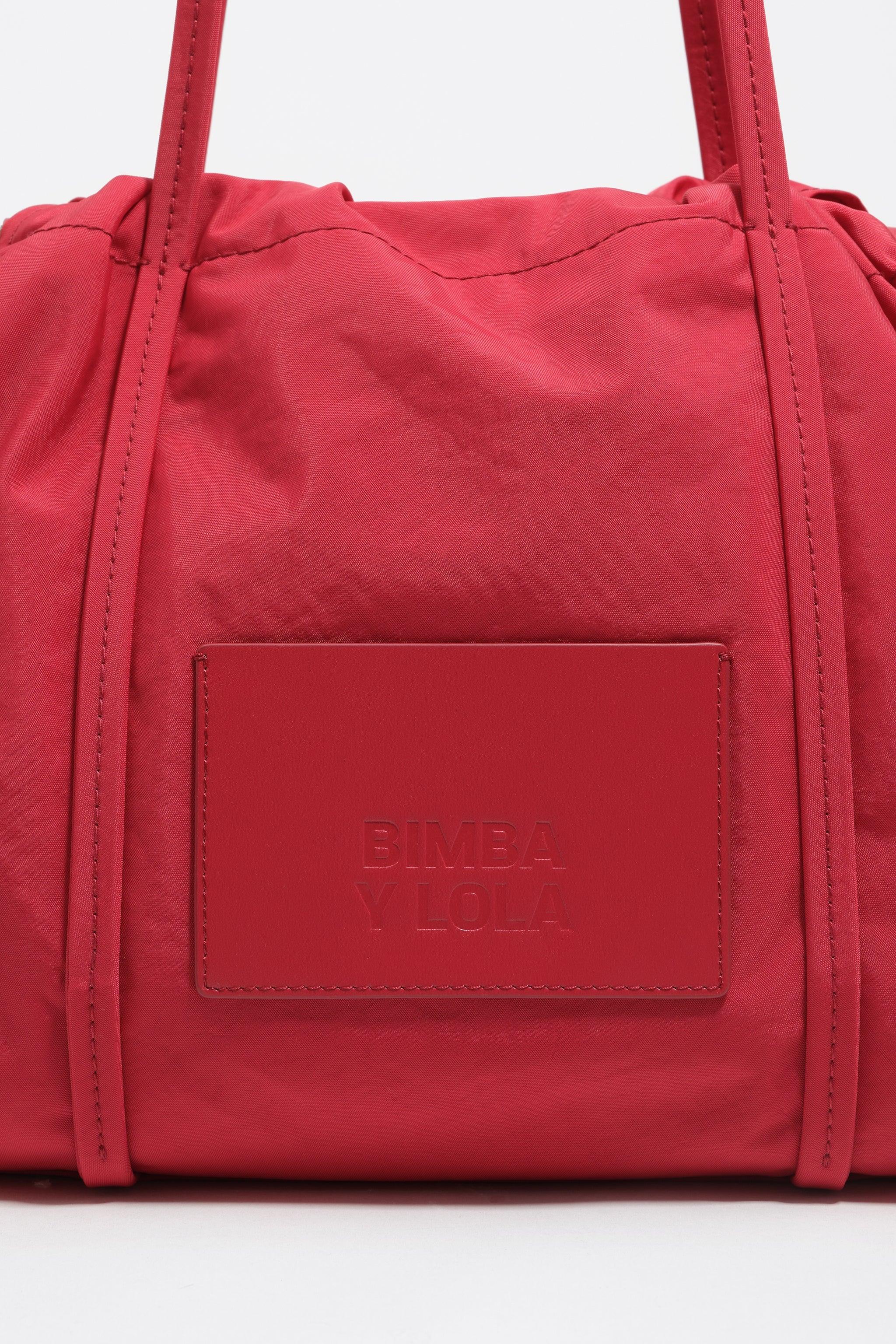 תיק יד אדום של BIMBA Y LOLA, אופנה ממותג יוקרתי באתר CHOZEN