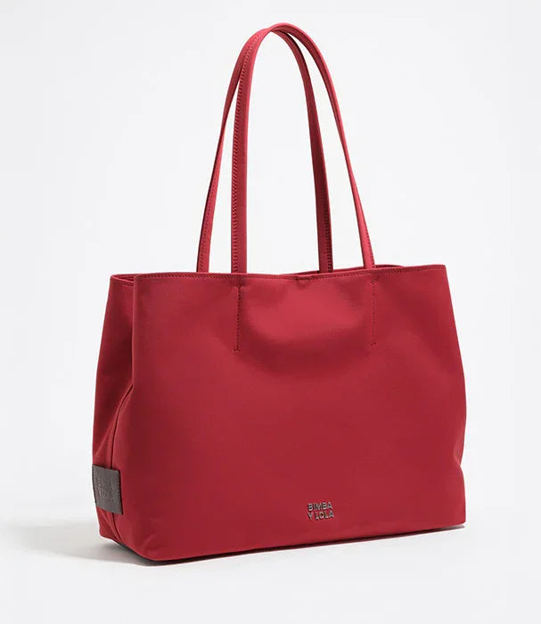 תיק קלאסי אדום לנשים מבית המותג BIMBA Y LOLA מקבוצת אלפא, צולם על רקע לבן