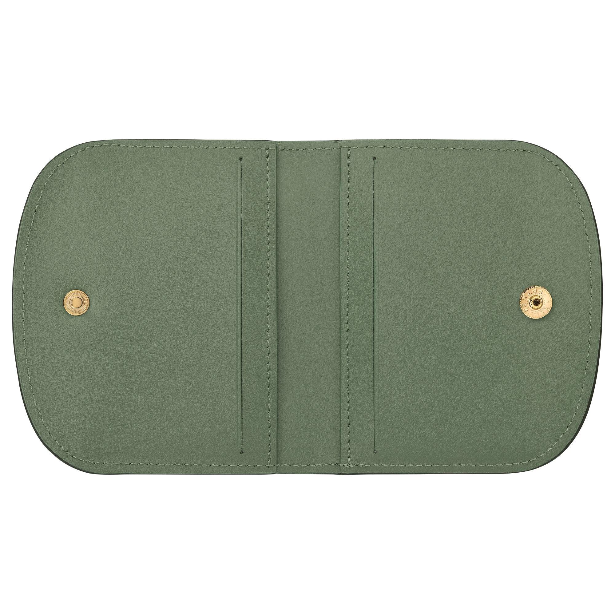 ארנק עור ירוק פתוח עם כפתורי זהב, מוצר יוקרה מבית CHOZEN