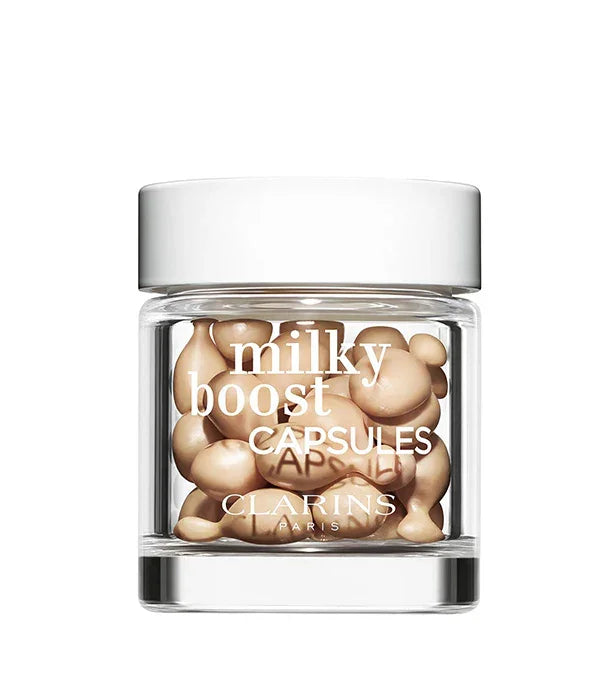צנצנת קפסולות Clarins Milky Boost מוצגת על רקע לבן, מוצר טיפוח יוקרה מחנות CHOZEN