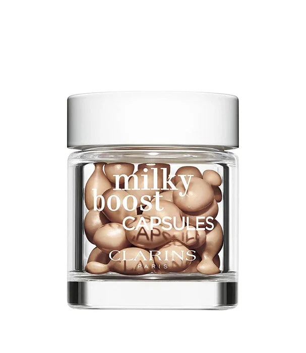 צנצנת קפסולות טיפוח clarins milky boost על רקע לבן, מותג בינלאומי ב-CHOZEN