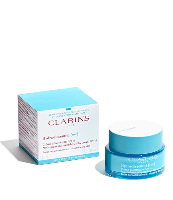 קרם לחות Clarins Hydra-Essentiel SPF 15, לצידו האריזה, מוצר קוסמטיקה יוקרתי מבית CHOZEN