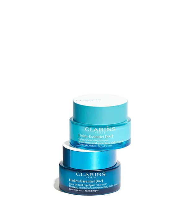 צמד קרמי Clarins Hydra-Essentiel בגדלים שונים על רקע לבן, מוצרי טיפוח יוקרתיים מבית CHOZEN