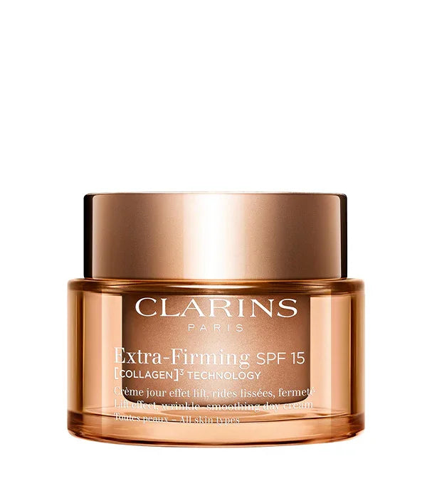 קרם יום ממצק Clarins Extra-Firming SPF 15 בצנצנת חומה מזהב, מותג טיפוח מוביל ב-CHOZEN