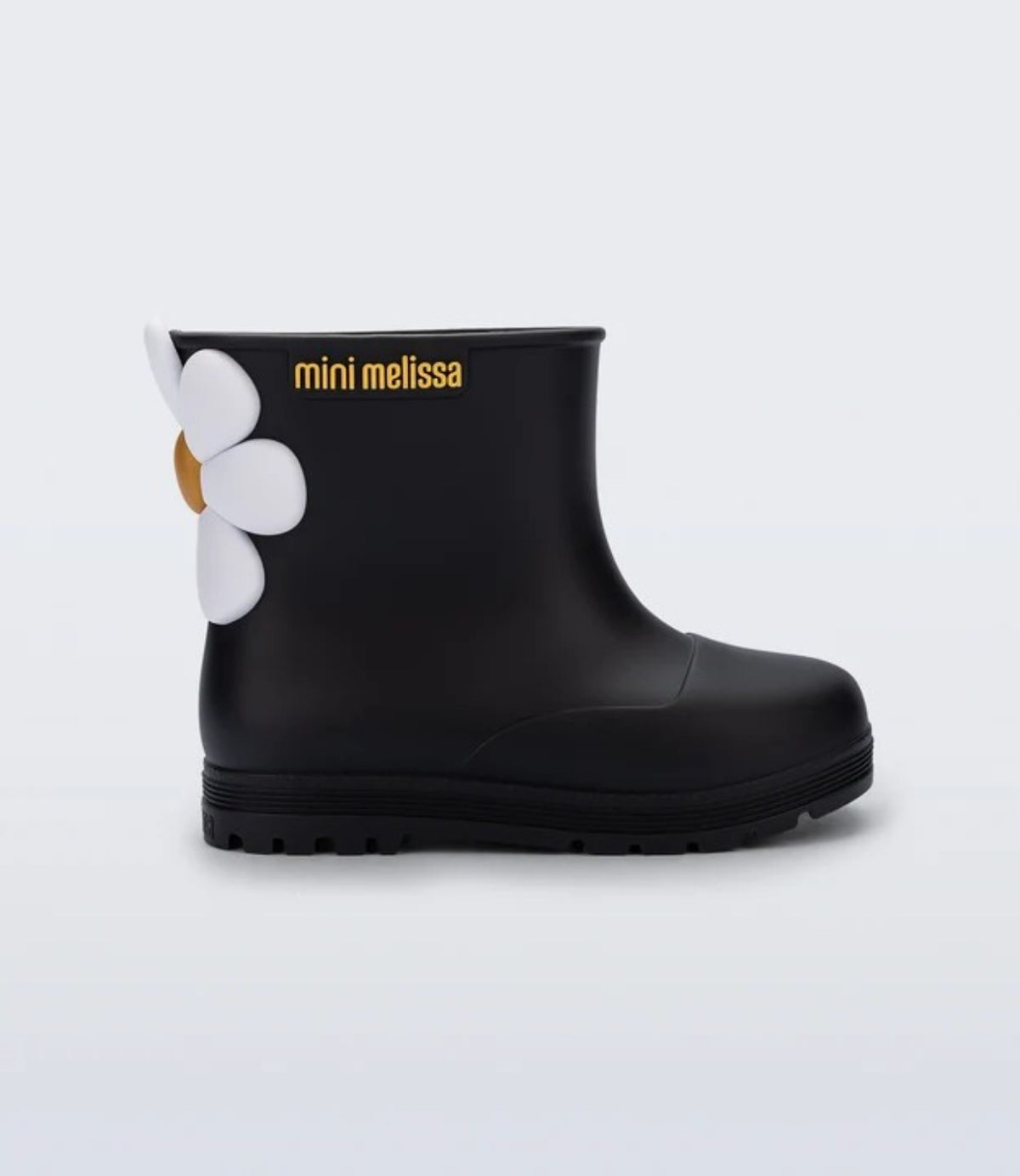 מגף גשם שחור בודד מבט צד עם פרח לבן ולוגו mini melissa - CHOZEN