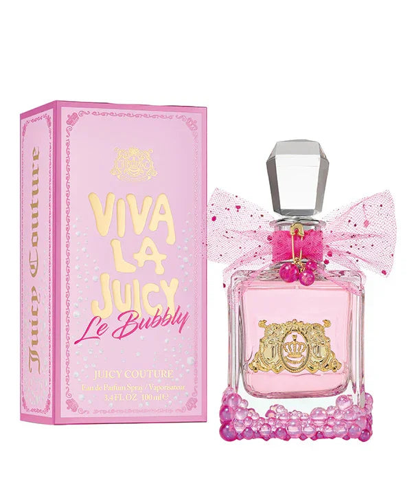 בושם Viva La Juicy Le Bubbly מבית Juicy Couture בקופסה ורודה, מוצג ליד הבקבוק המעוצב