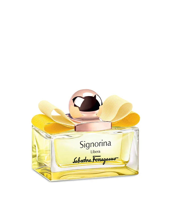 בושם Signorina Libera של Salvatore Ferragamo עם מכסה זהב וסרט צהוב, מבית CHOZEN