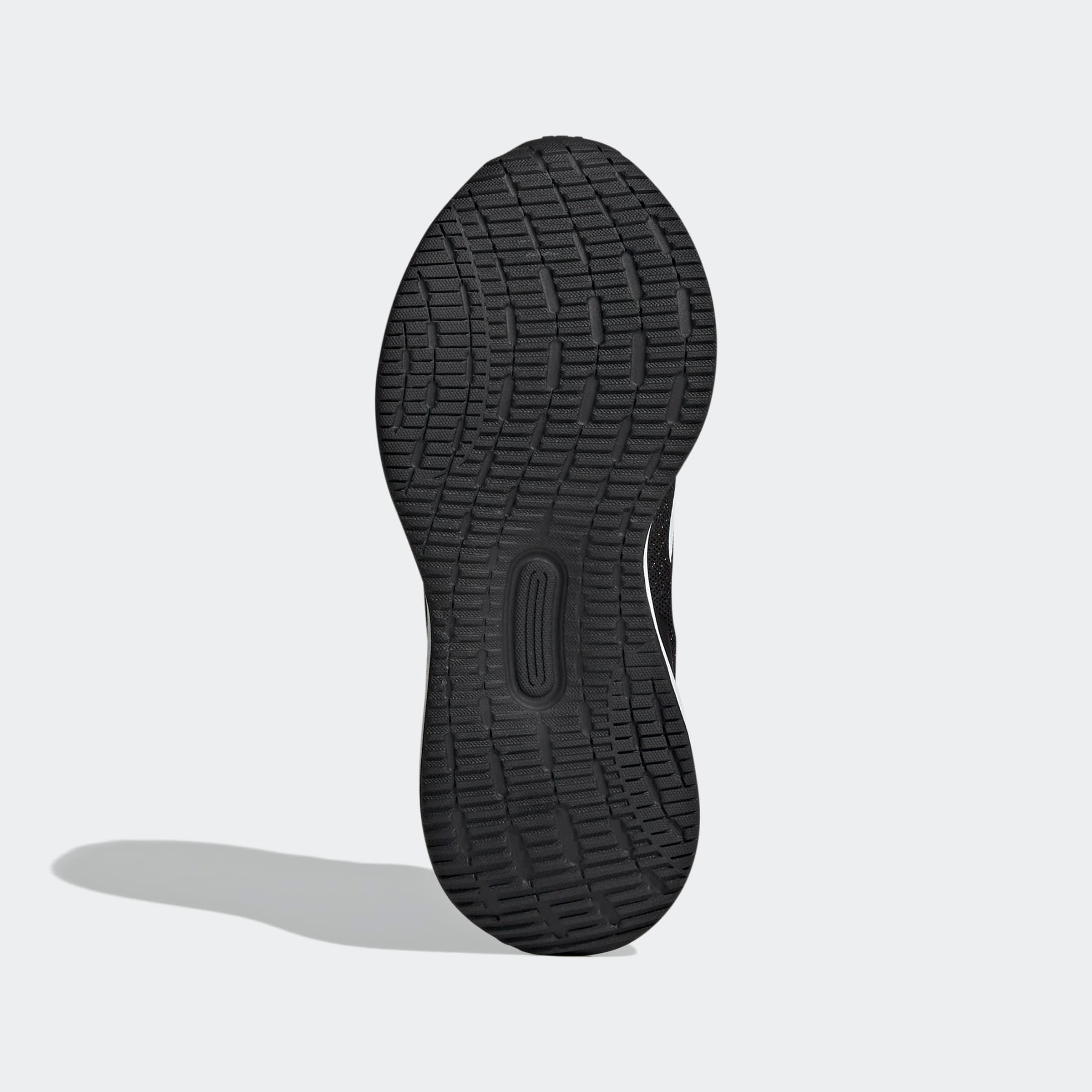 סוליית נעל ריצה שחורה עם דוגמה מובחנת, צילום מוצר לאתר CHOZEN