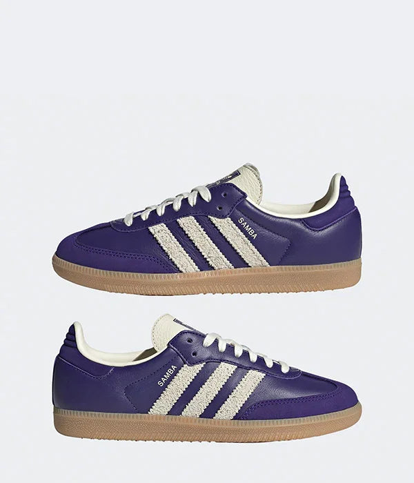 נעלי אדידס סאמבה סגולות עם סוליית גומי, מוצגות בזוג על רקע לבן בחנות CHOZEN