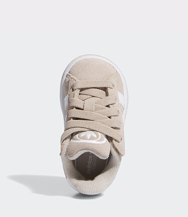 נעל סניקרס בז' יוניסקס עם שרוכים, מבט עליון, עיצוב מודרני וקווים לבנים