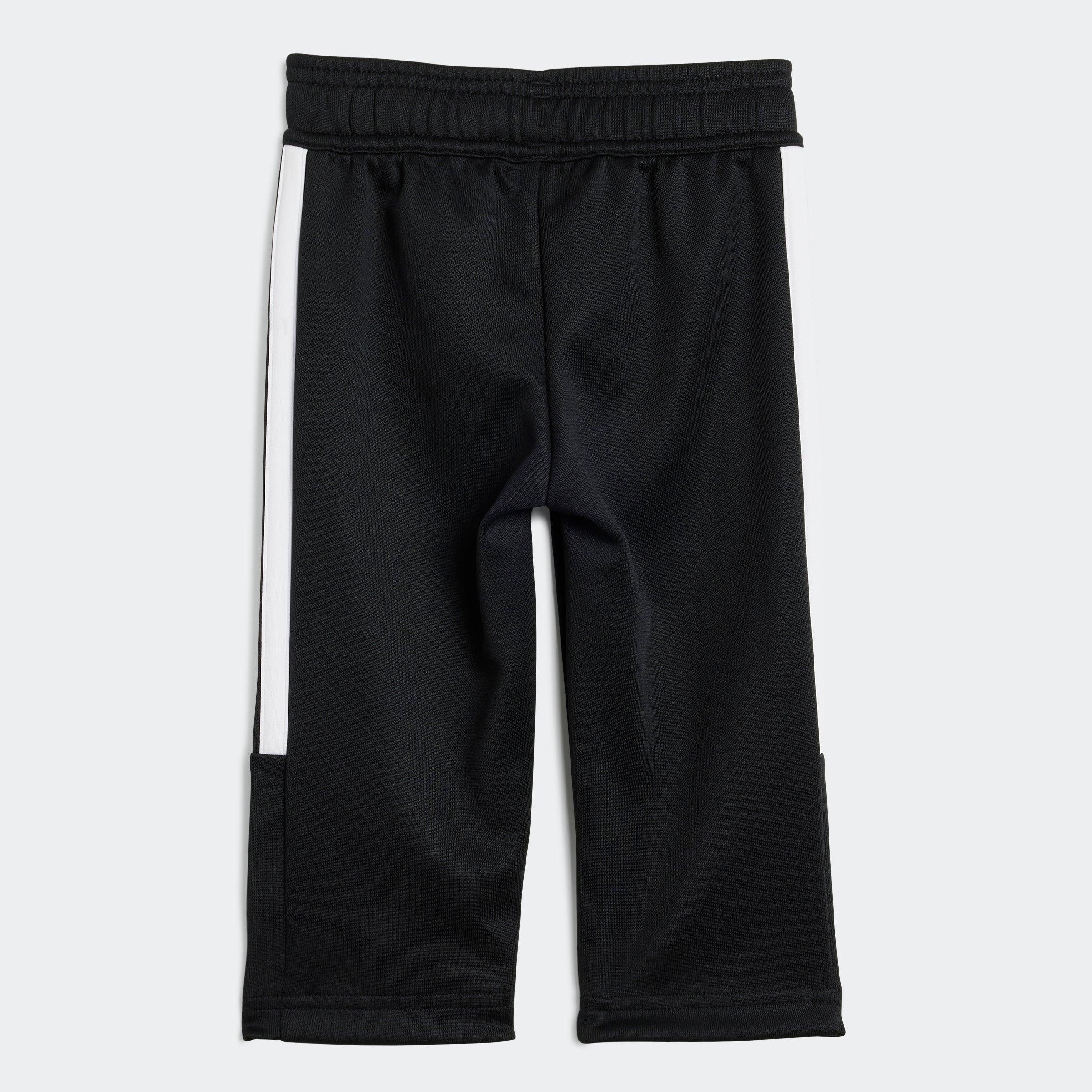 מכנסי ספורט לילדים בצבע שחור עם פסי צד לבנים, CHOZEN, צילום אחורי על רקע אפור