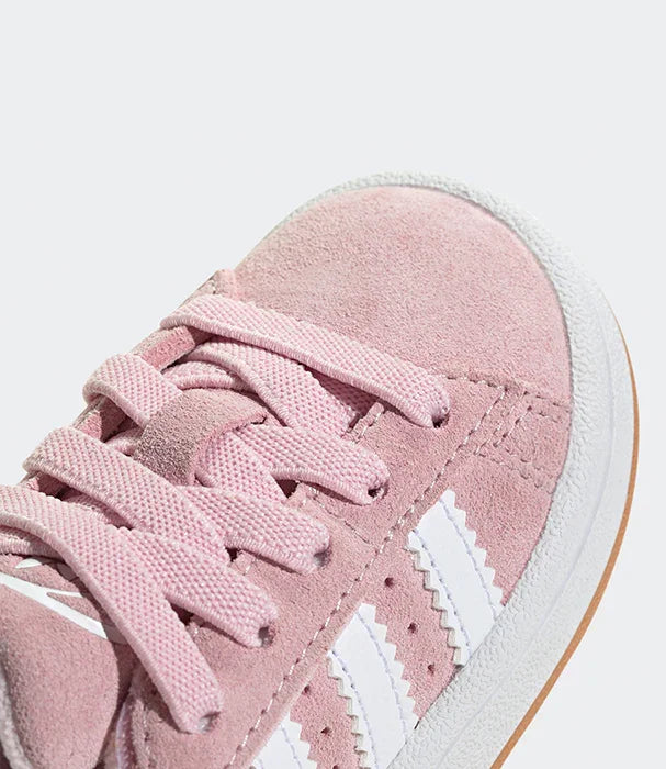 נעל ספורט ורודה עם סוליה לבנה וחמשת הפסים, צילום תקריב, CHOZEN מותגים מובילים