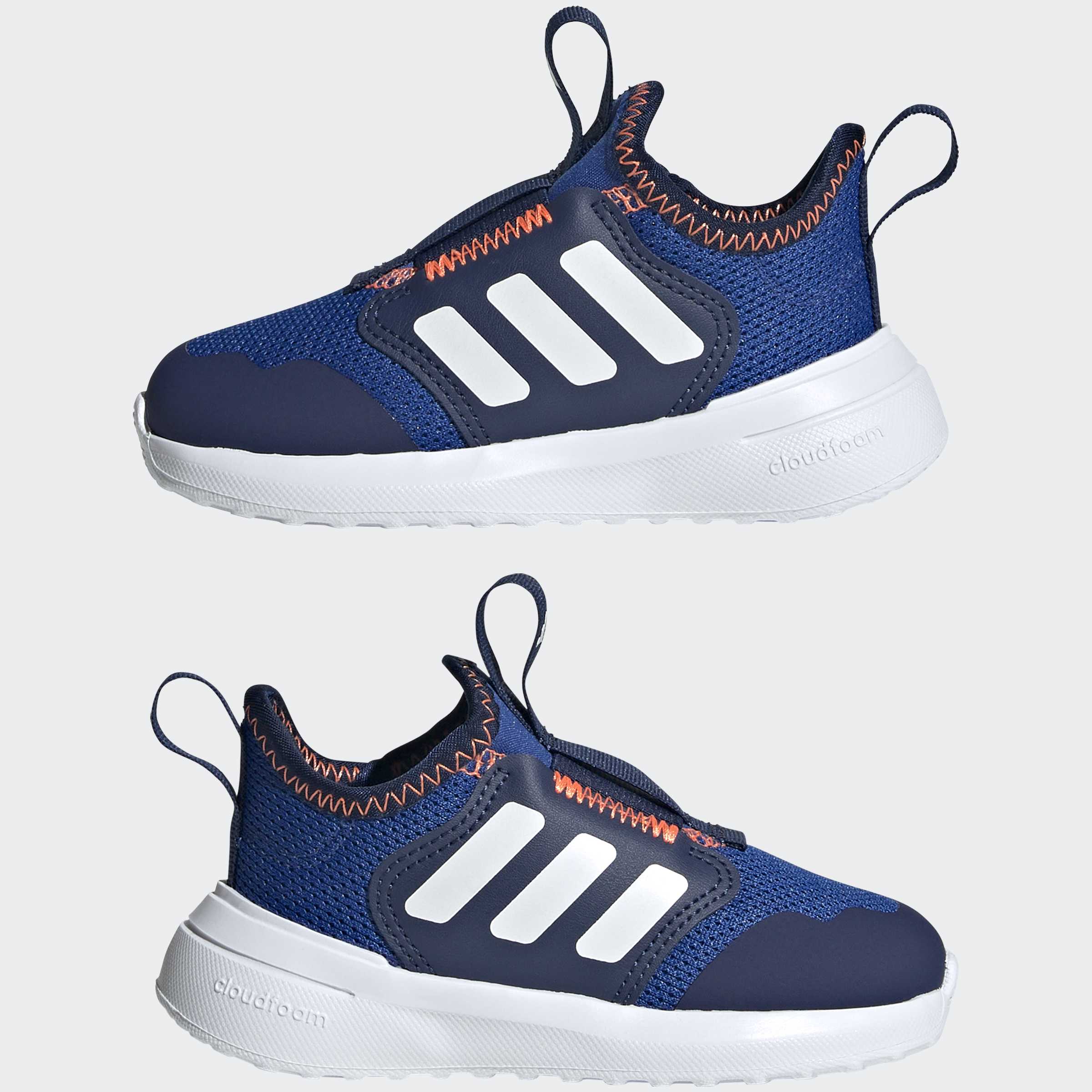 נעלי ספורט ילדים בצבע כחול עם סוליה לבנה, עיטורים כתומים וסרטי לולאה