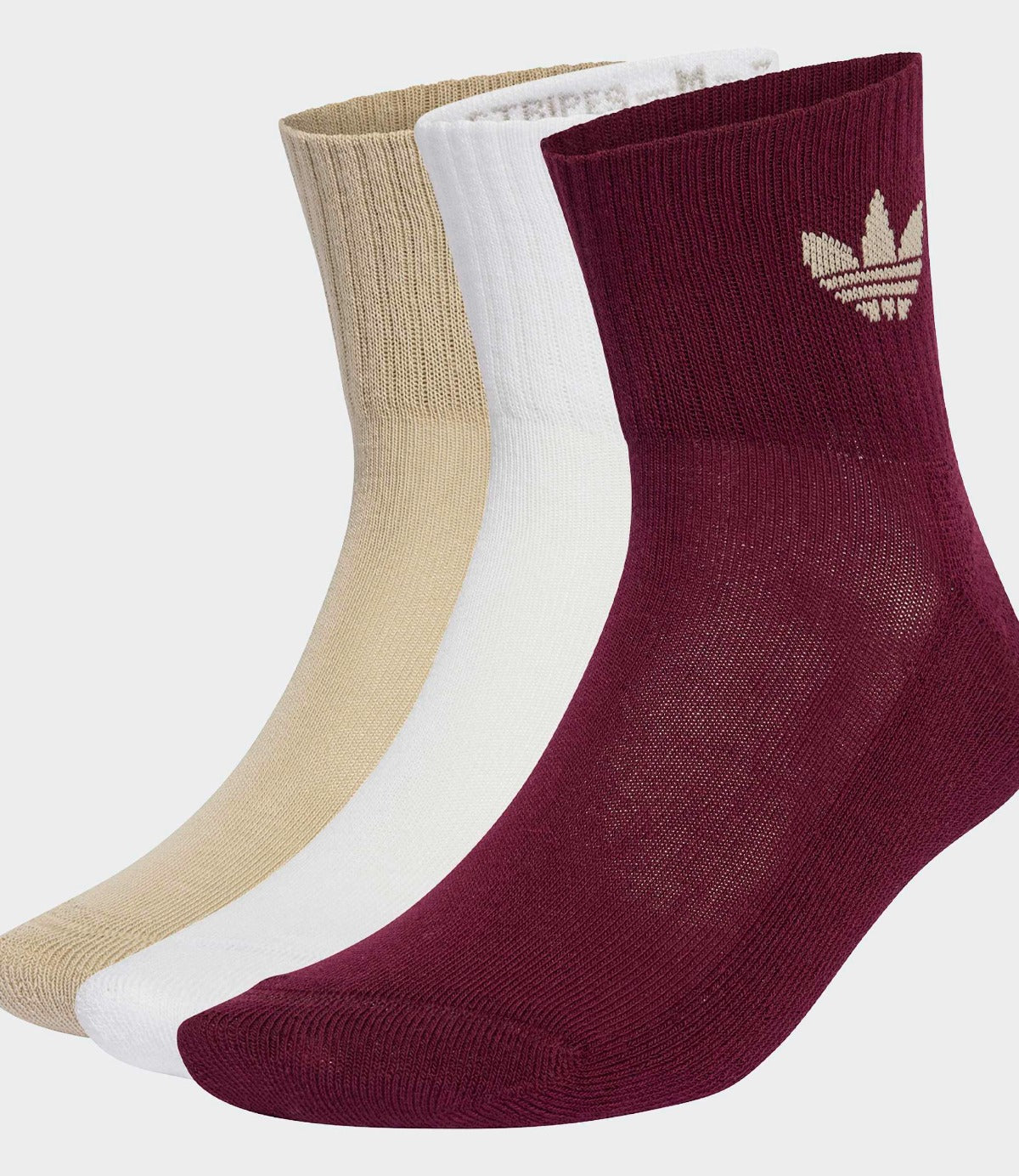 שלישיית גרביים בגוון בורדו, לבן ובז', גרב עם לוגו טריפוליה, צילום צד על רקע לבן