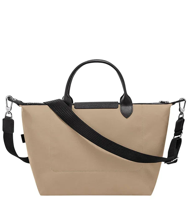 תיק יד בז' עם רצועה שחורה, עיצוב אלגנטי, מבית CHOZEN, מותגים מובילים בישראל