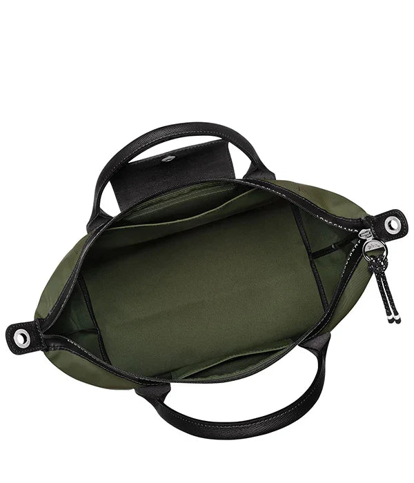 תיק ירוק מבית CHOZEN עם ידיות שחורות ותא פנימי מרווח, מראה עליון