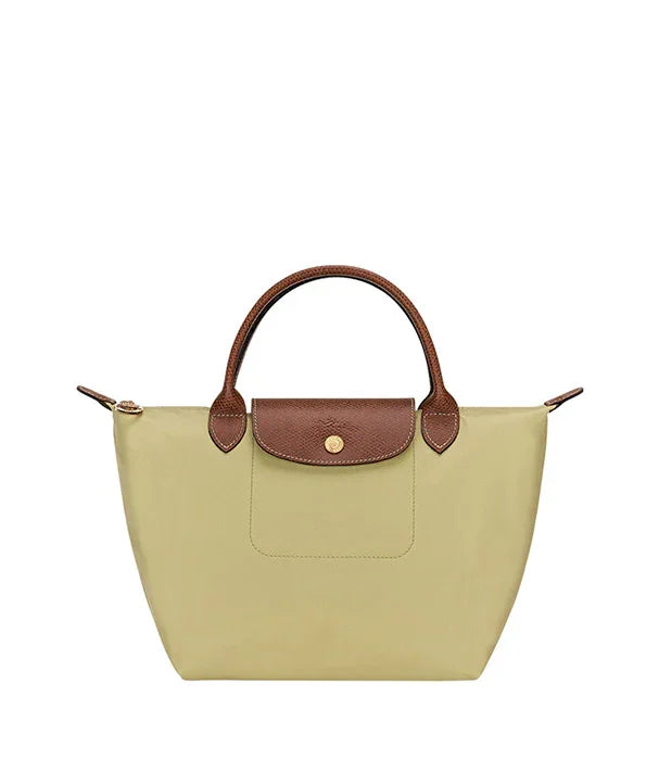 תיק יד בצבע בז' עם ידיות וכיס חום מעור, עיצוב יוקרתי באתר CHOZEN מותגים מובילים