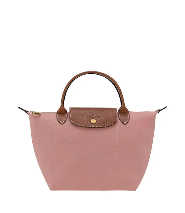 תיק יד ורוד עם ידיות חומות מבית CHOZEN, אופנתי ומעוצב לקיץ