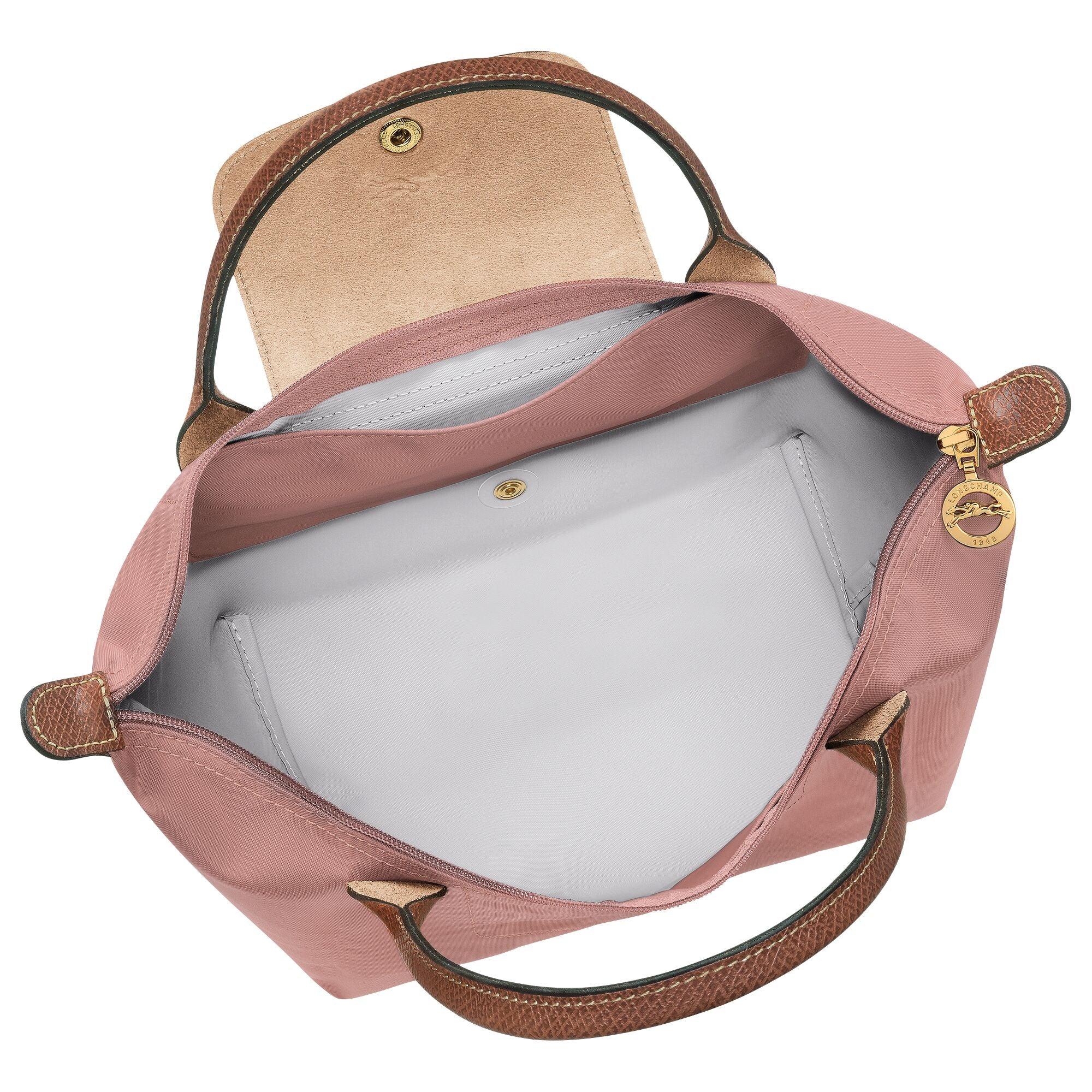 תיק נשי ורוד עם ידיות חומות, חלל פנימי מרווח, איכותי מבית CHOZEN