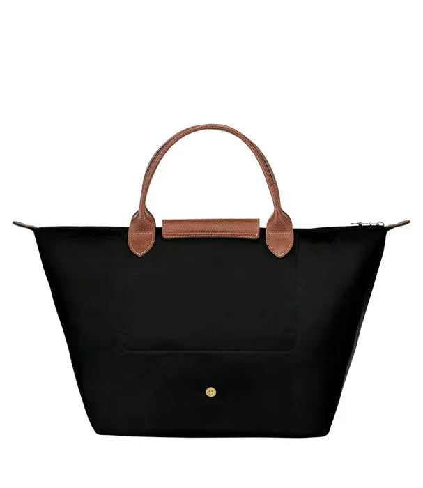 תיק יד שחור עם ידיות עור חום בעיצוב יוקרתי, מבית המותגים המובילים CHOZEN