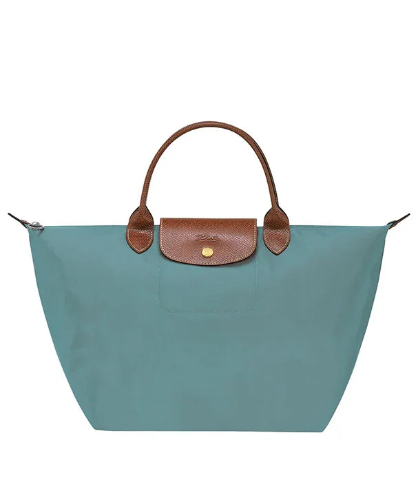 תיק יד אופנתי לנשים בצבע טורקיז עם ידיות ועיטורים חומים, מותג יוקרתי ב-CHOZEN