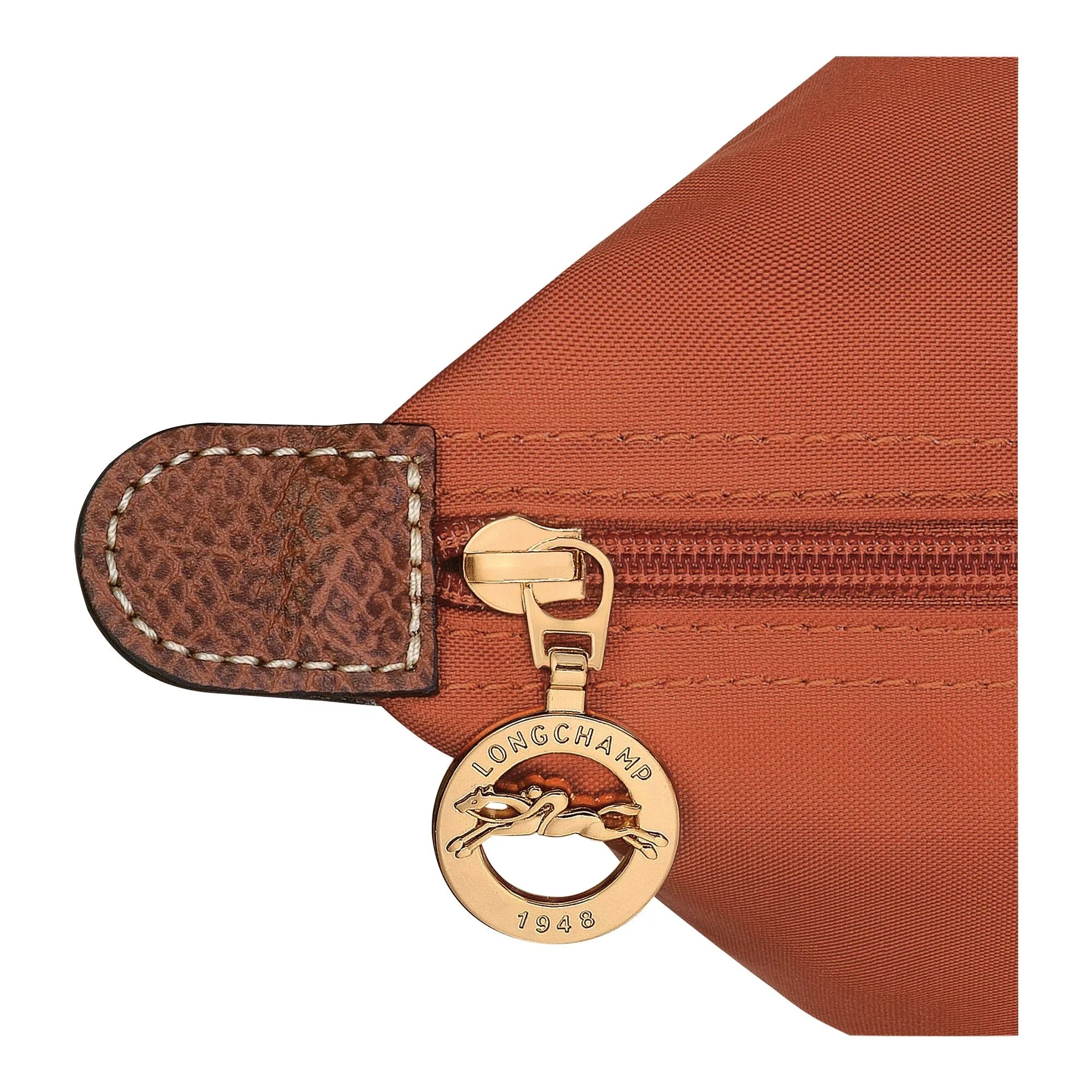 רוכסן תיק לונגשאמפ כתום עם תג לוגו מוזהב, פריט יוקרה CHOZEN מבית קבוצת אלפא