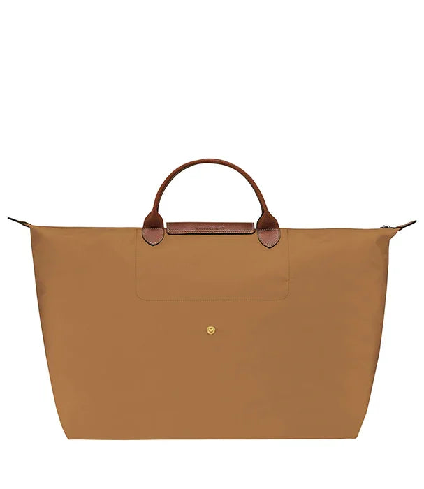 תיק נסיעות חום עם ידיות עור, עיצוב אלגנטי, מבית מותג יוקרה בינלאומי ב-CHOZEN