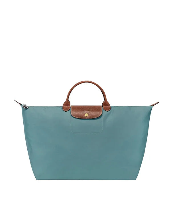 תיק יד אופנתי עם ידיות עור חומות, צבע תכלת, מוצג באתר CHOZEN מותגים מובילים