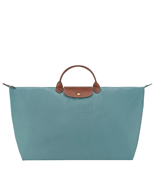 תיק יד גדול תכלת עם ידית חומה, עיצוב אלגנטי, מבית CHOZEN מותגים מובילים