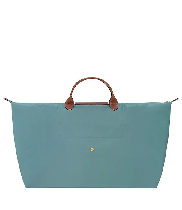 תיק נסיעות גדול בצבע תכלת עם ידיות עור חום, CHOZEN, אופנה יוקרתית