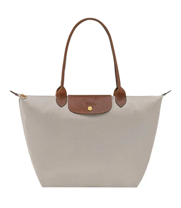 תיק יד אופנתי בצבע בז' עם ידיות ועיטור חום, מבית CHOZEN מותגים מובילים