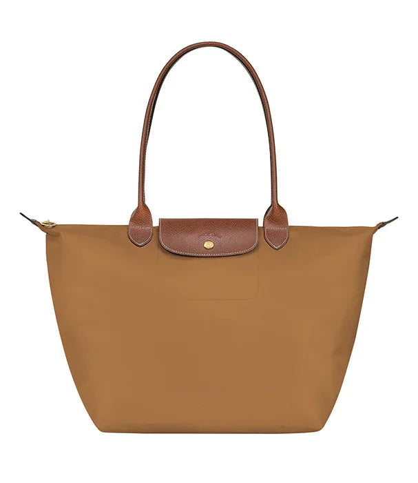 תיק יד לנשים בצבע חום בהיר עם ידיות ועיטורי עור, ממותגי יוקרה מבית CHOZEN