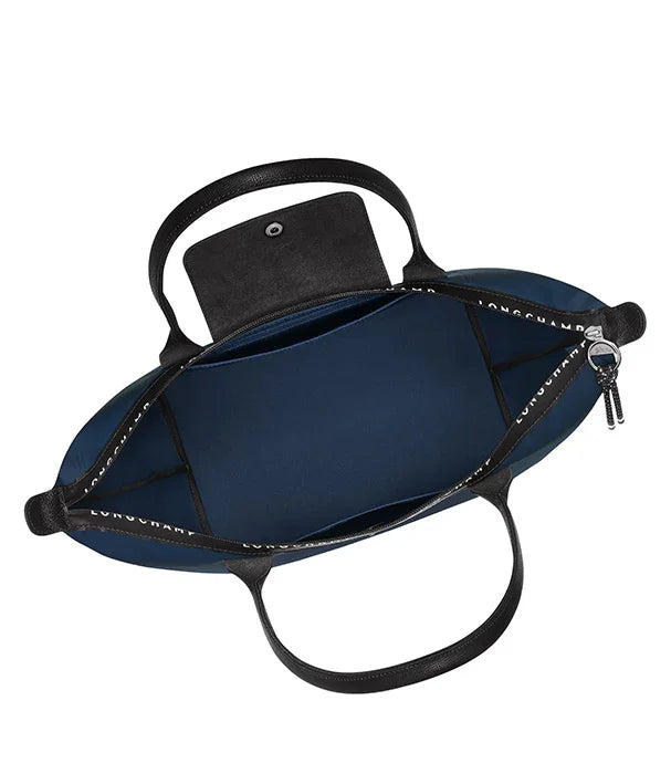 תיק יד כחול מבית LONGCHAMP עם רצועות שחורות, מבט פנימי, נמכר ב-CHOZEN מותגים מובילים