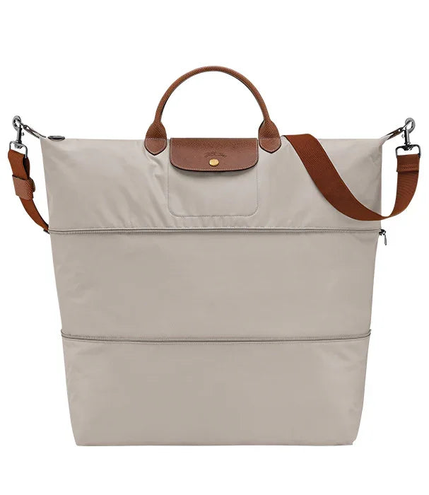 תיק נשיאה אופנתי בצבע בז', עם ידיות ועיטורים חומים, דגם יוקרתי באתר CHOZEN